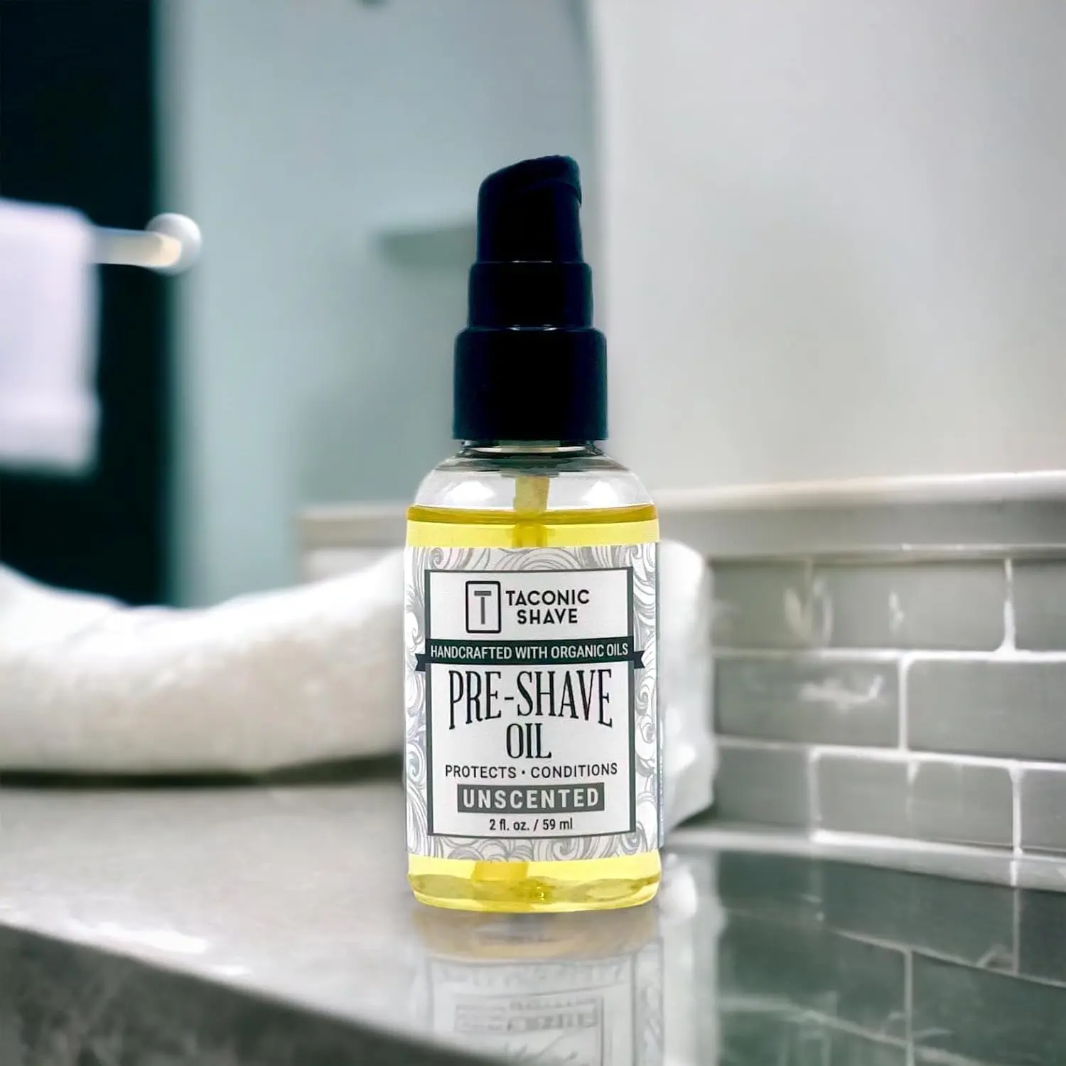 Taconic Shave all natural pre-shave oil in a pump bottle, made with organic oils and vitamin E for a smooth, comfortable shave.
