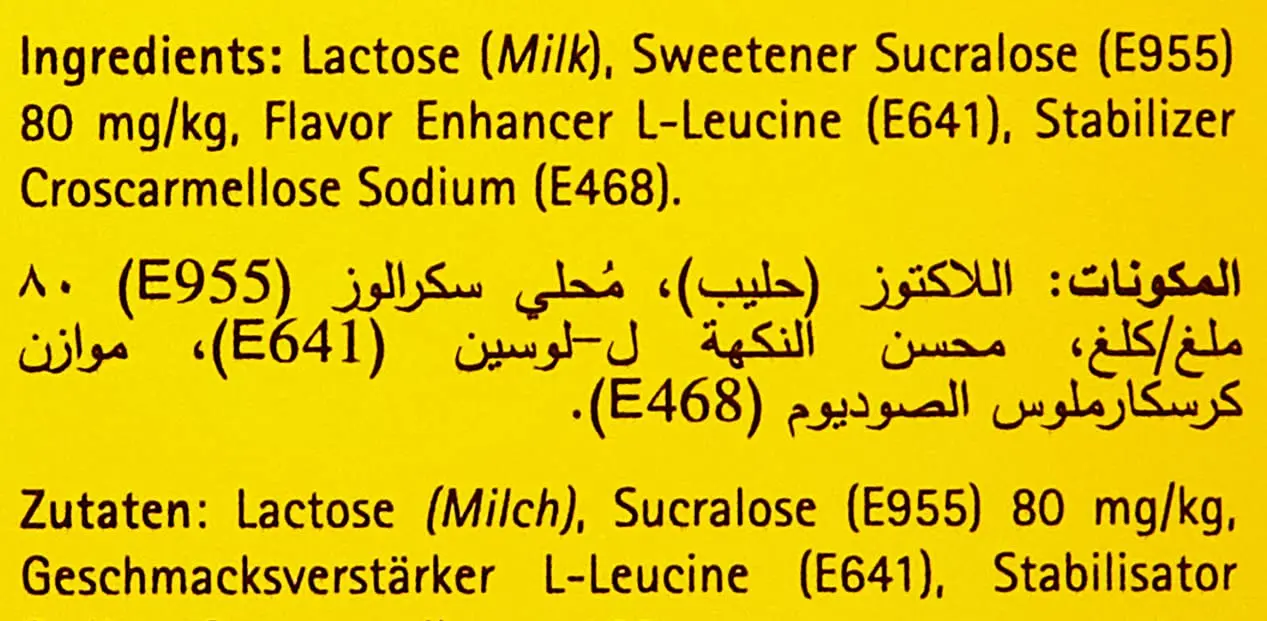 Close-up of Tropicana Slim zero-calorie sweetener tablets, a smooth, sugar-free, saccharin-free, and preservative-free option with no bitter aftertaste.