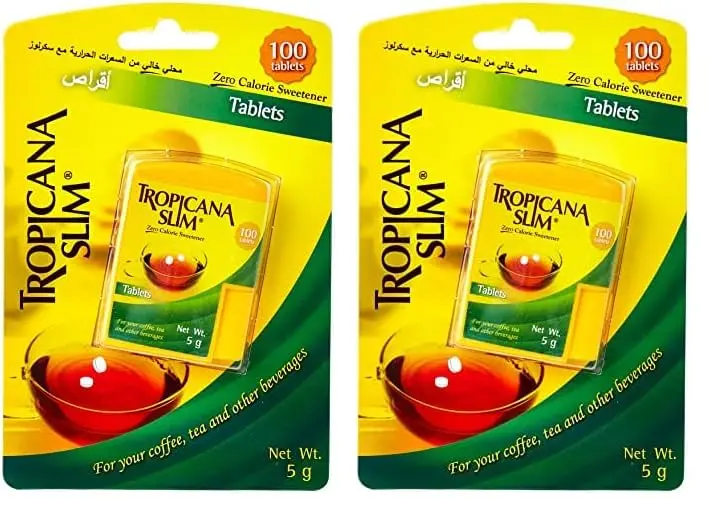 Close-up of Tropicana Slim zero-calorie sweetener tablets, a smooth, sugar-free, saccharin-free, and preservative-free option with no bitter aftertaste.