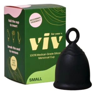 Small dark-colored V menstrual cup made of medical-grade silicone with a ring stem for easy removal, a comfortable and safe alternative to tampons and pads.