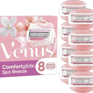Eight Gillette Venus ComfortGlide Spa Breeze women's razor blade refills featuring a Lubrastrip with botanical oils for a smooth, comfortable shave.