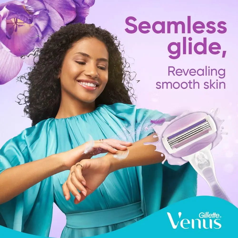 Four Venus ComfortGlide Breeze razor refill cartridges with flexible moisture bars and three blades for a smooth shave.