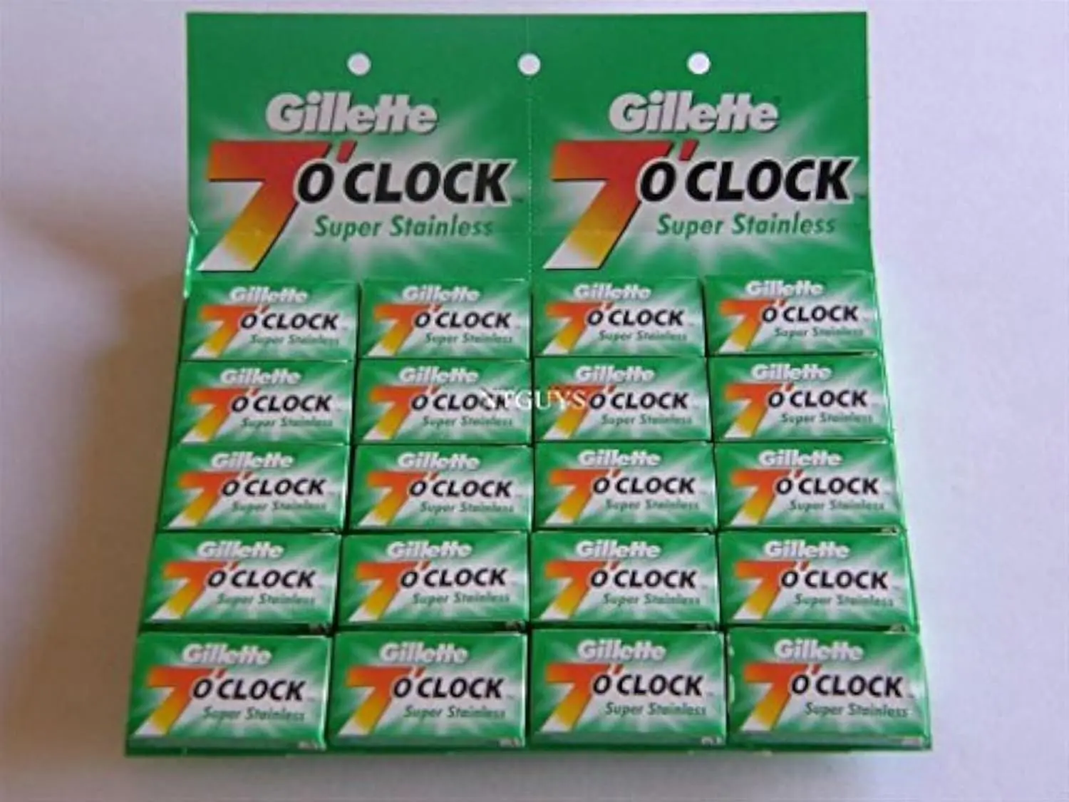 A display card of twenty 7 O'Clock Super Stainless double edge razor blade tucks, with each tuck containing 5 blades made in Russia, totaling 100 smooth shaving blades for all double edge safety razors.