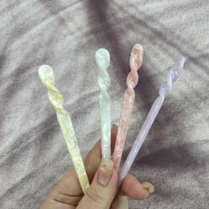Four acetate hair sticks, vintage-style chopsticks for women and girls to create buns and style long hair.