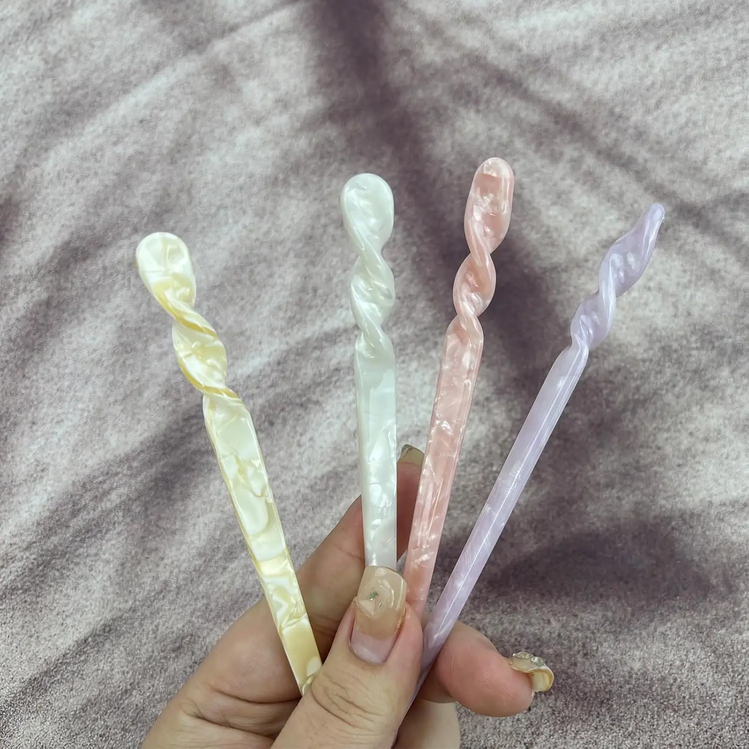 Four acetate hair sticks, vintage-style chopsticks for women and girls to create buns and style long hair.