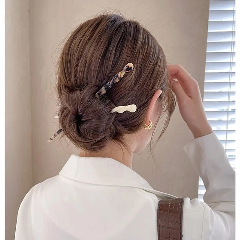 Four acetate hair sticks, vintage-style chopsticks for women and girls to create buns and style long hair.