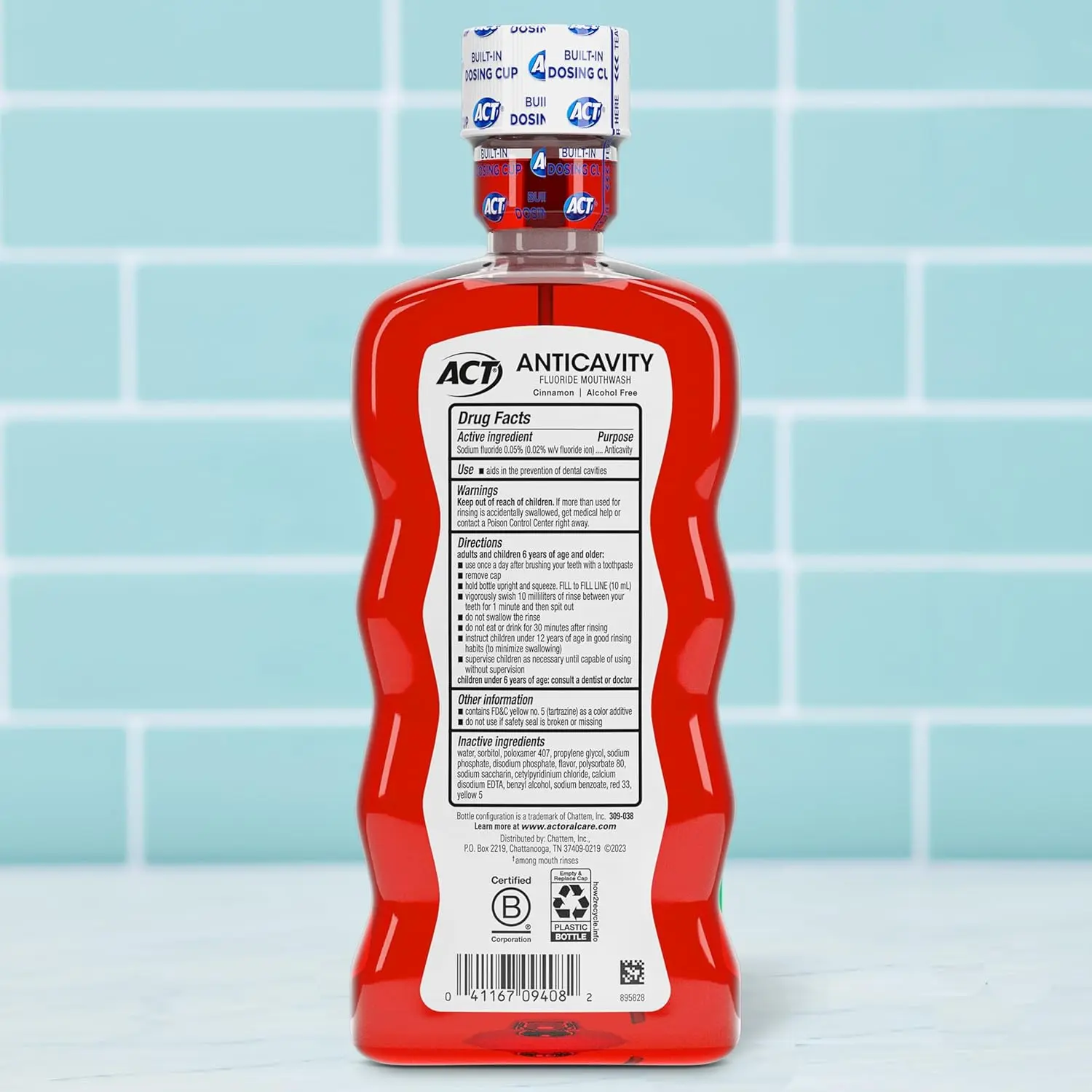ACT Anticavity Zero Alcohol Fluoride Mouthwash in Cinnamon flavor, offering cavity prevention, teeth strengthening, and fresh breath with an accurate dosing cup.