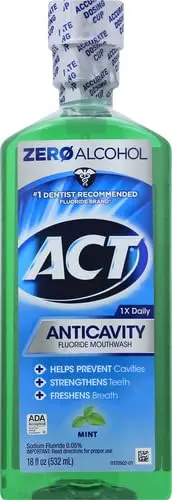 A bottle of ACT Anticavity Fluoride Rinse that kills bad breath, strengthens enamel, and restores minerals.