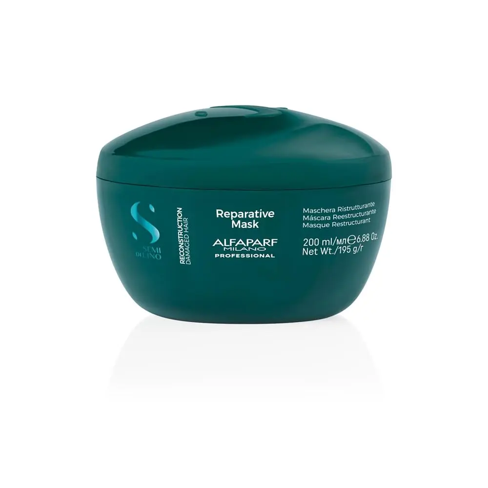 Alfaparf Milano Reconstruction Reparative Mask deeply nourishes and repairs damaged hair, increasing resistance to breakage.
