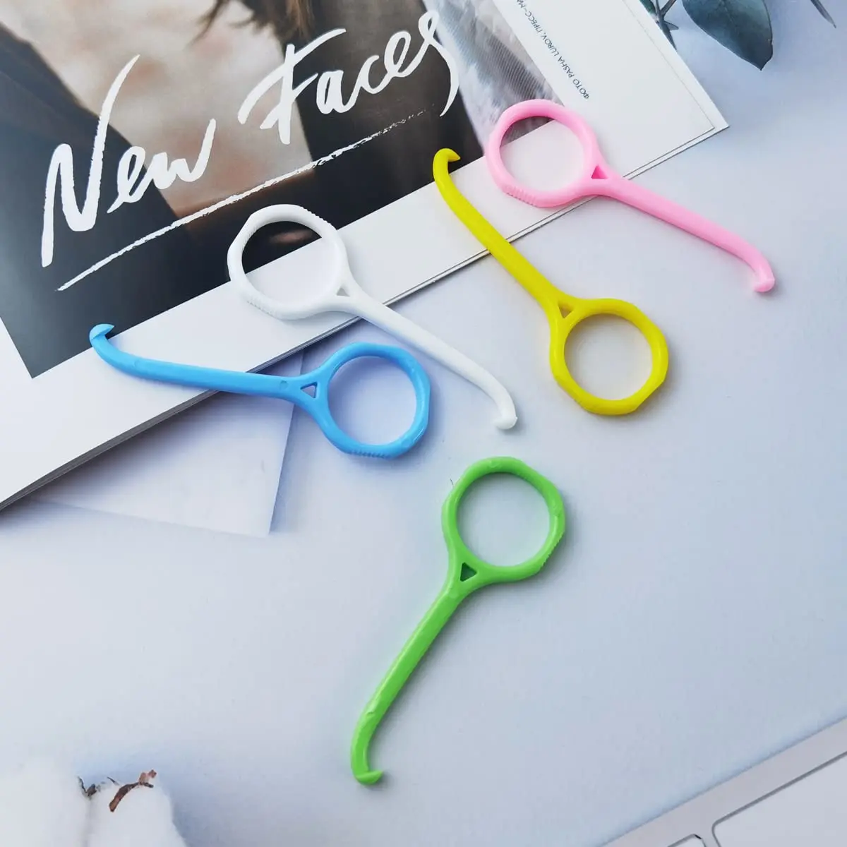 This image shows a set of 15 aligner removal tools in 5 different colors, designed for safely and effectively removing clear aligners.