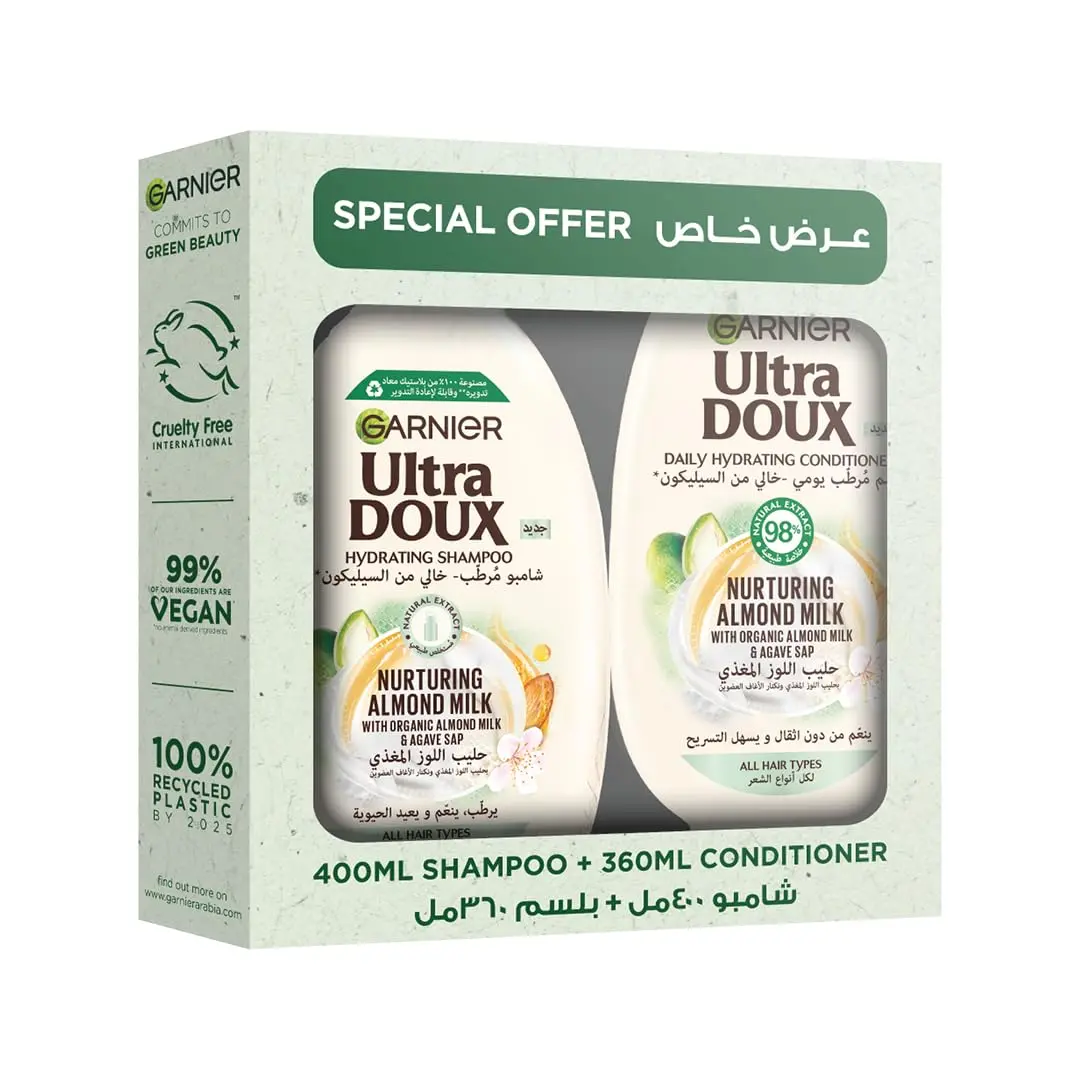 Garnier Ultra Doux almond milk shampoo and conditioner set, designed to hydrate and nurture all hair types without weighing them down, formulated with organic ingredients.