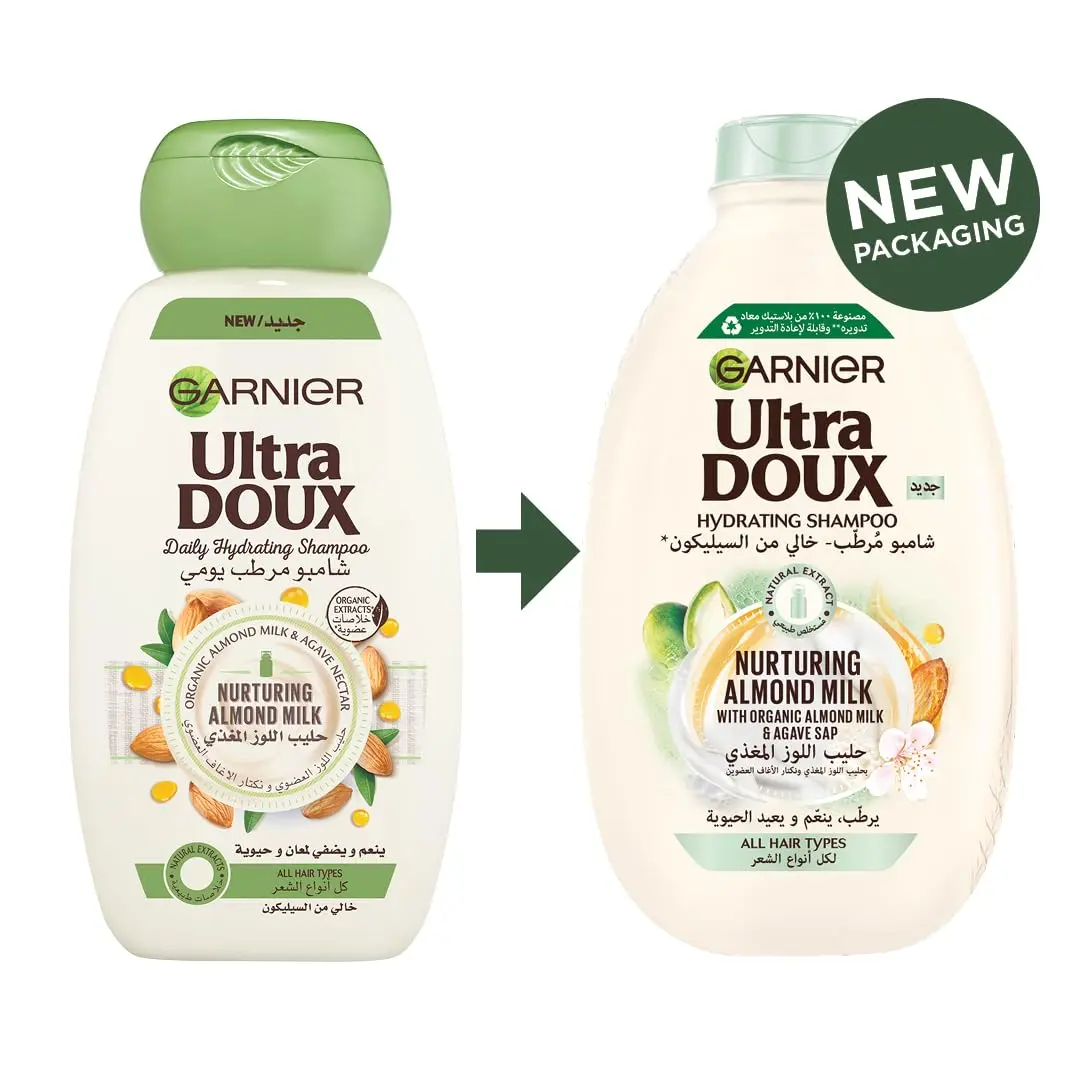 Garnier Ultra Doux almond milk shampoo and conditioner set, designed to hydrate and nurture all hair types without weighing them down, formulated with organic ingredients.