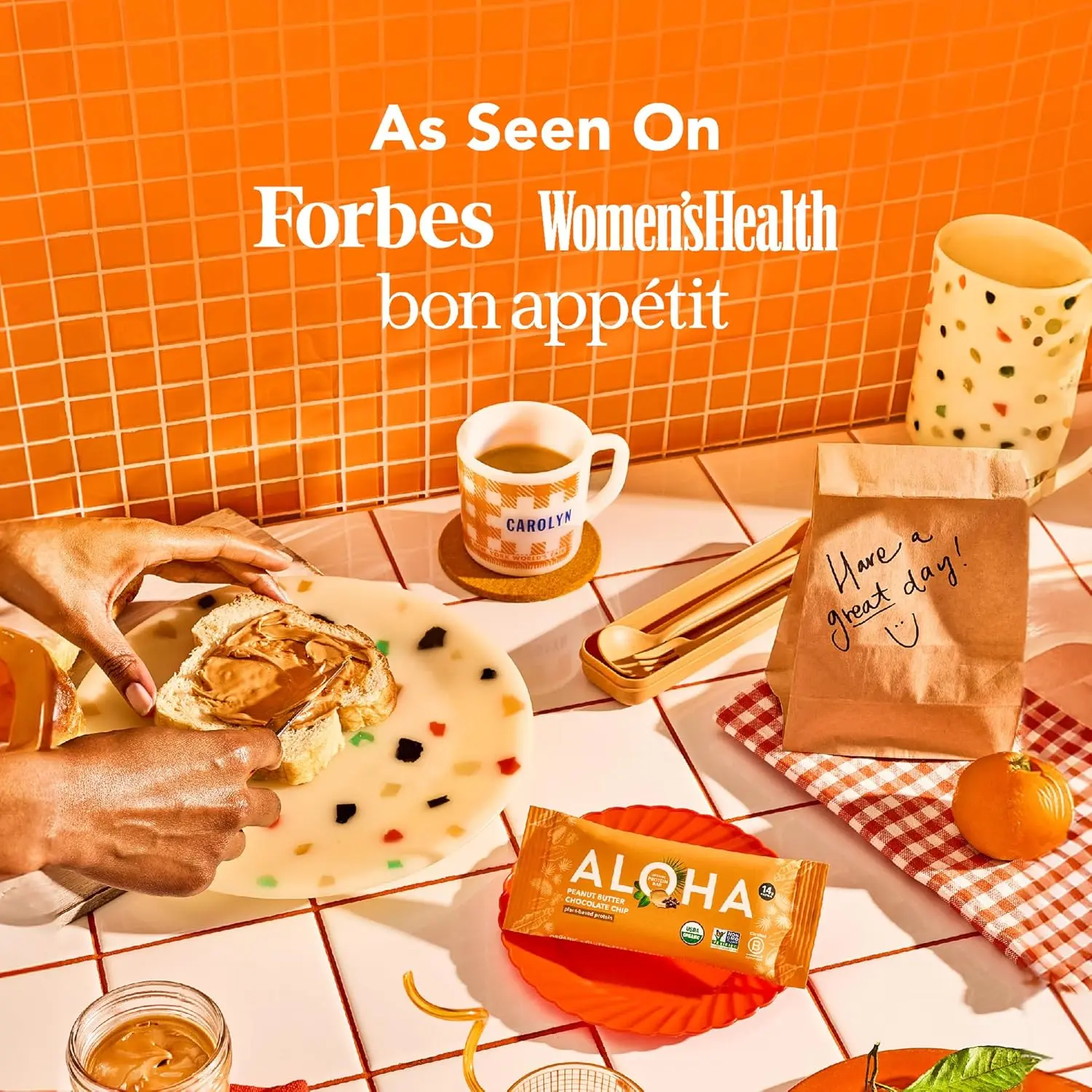 Twelve ALOHA Organic Plant Based Peanut Butter Chocolate Chip protein bars, a vegan, gluten-free, and paleo-friendly snack.