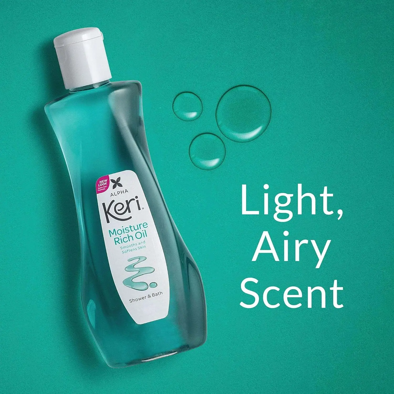 Eight bottles of Alpha Keri Moisture Rich Oil, a dermatologist-recommended bath and shower oil made in the USA, designed to smooth and soften skin.