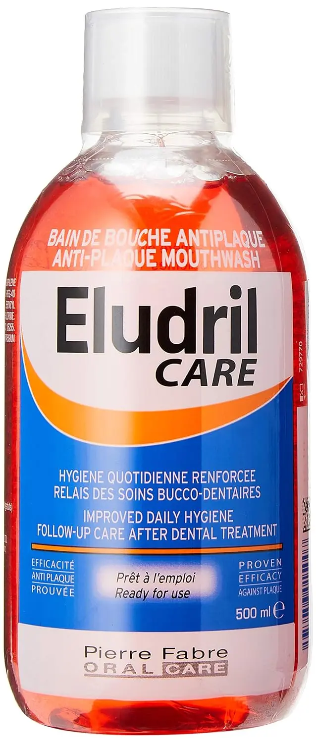 Bottle of antiplaque mouthwash for adults that is antibacterial and mint free, offering soothing oral care.