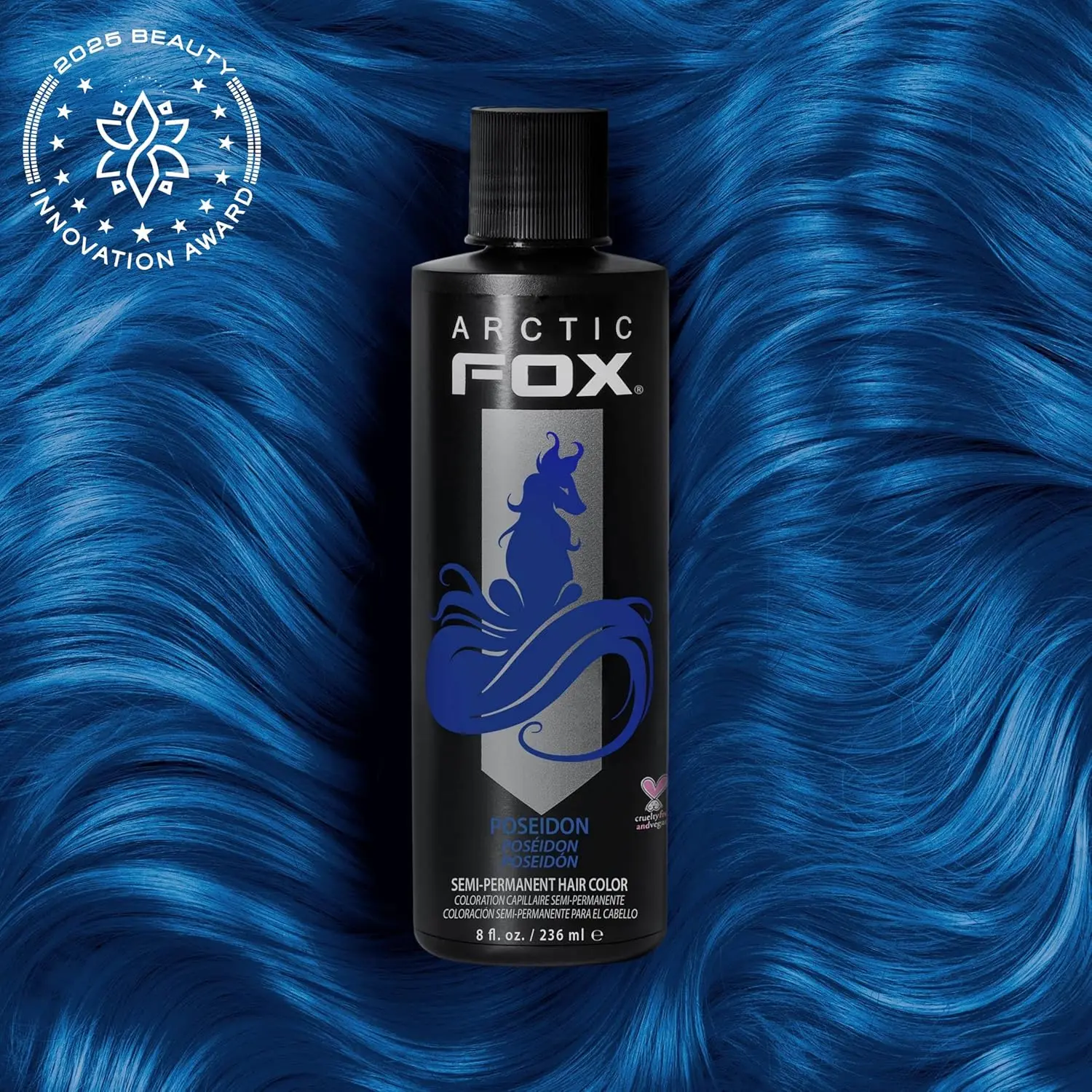 A bottle of Arctic Fox Poseidon blue hair dye, a vibrant, medium true blue vegan and cruelty-free semi-permanent hair color.