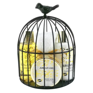 This four-piece argan oil bath and beauty set includes shower gel, body lotion, body exfoliant, and a face towel, presented in a decorative metal cage, making it a perfect gift for birthdays, Christmas, Mother's Day, or Valentine's Day.