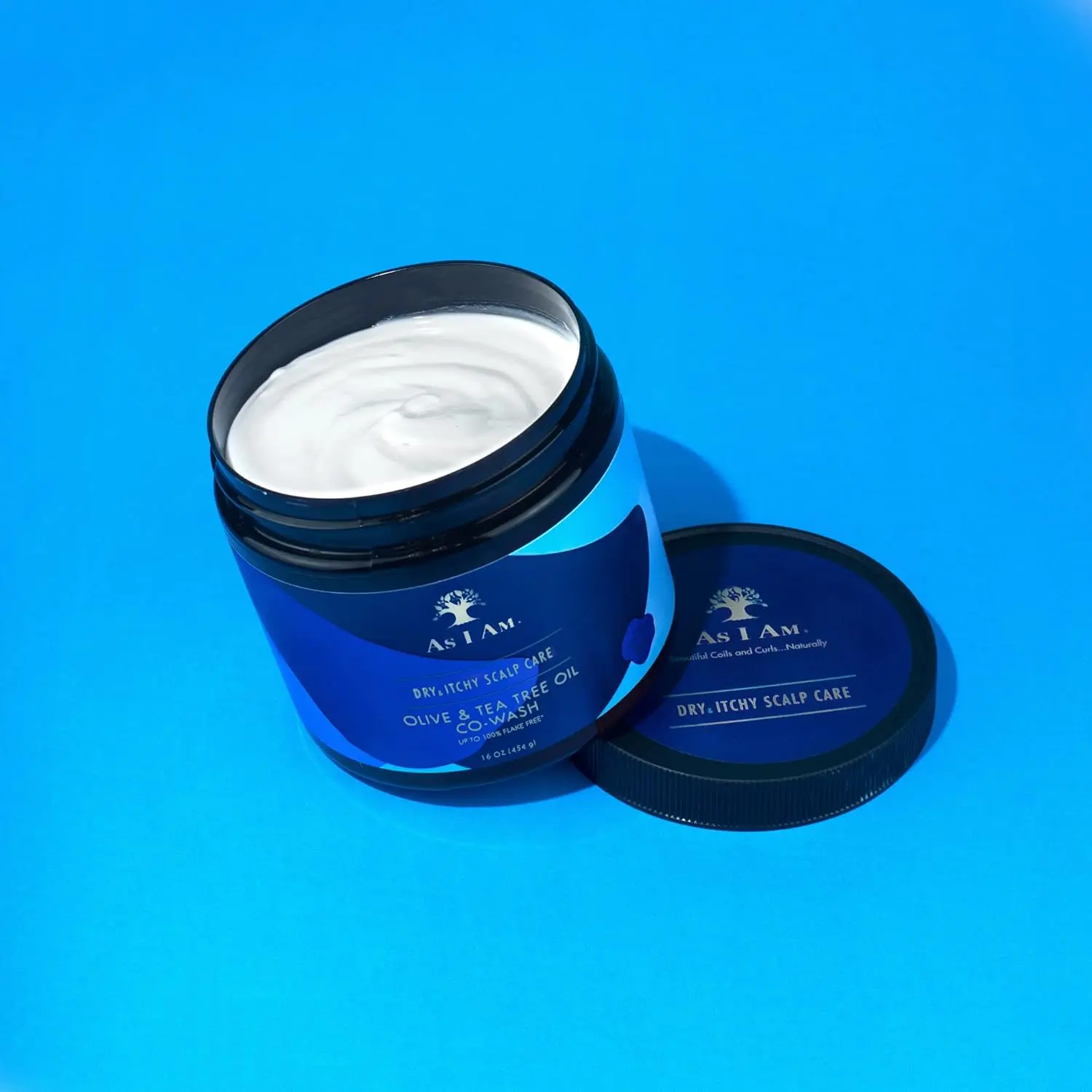 As I Am Dry & Itchy Scalp Care Cowash helps relieve scalp itchiness, flaking, and irritation while fighting dandruff with olive and tea tree oil.