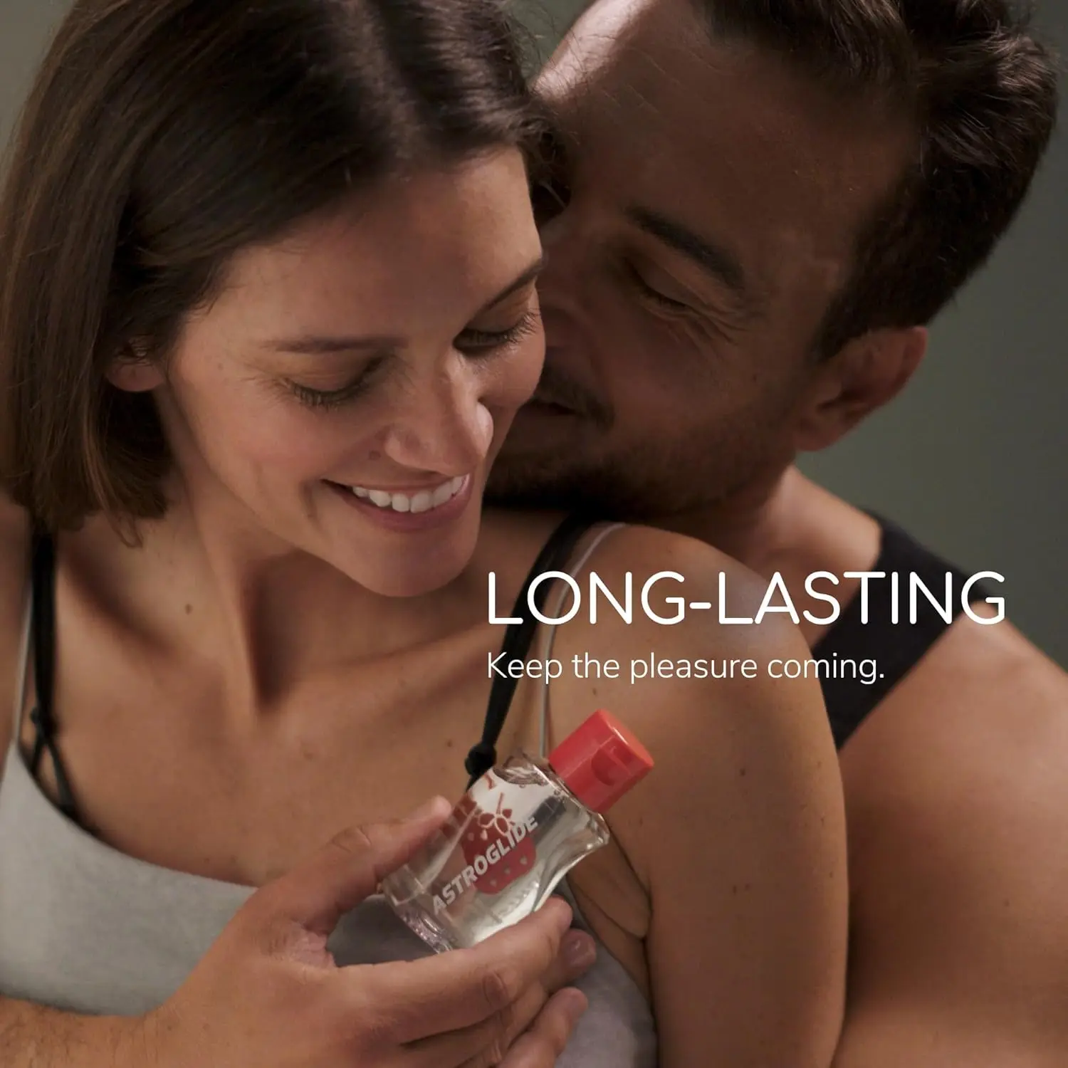 Astroglide strawberry flavored water based personal lubricant in hygienic packaging, formulated with care for enhanced pleasure.