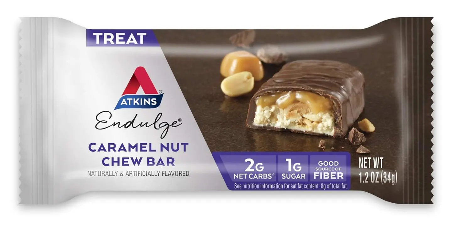 One Atkins Endulge Caramel Nut Chew bar featuring peanuts, nougat, a caramel layer, and chocolate coating, with 6 grams of fiber per serving.
