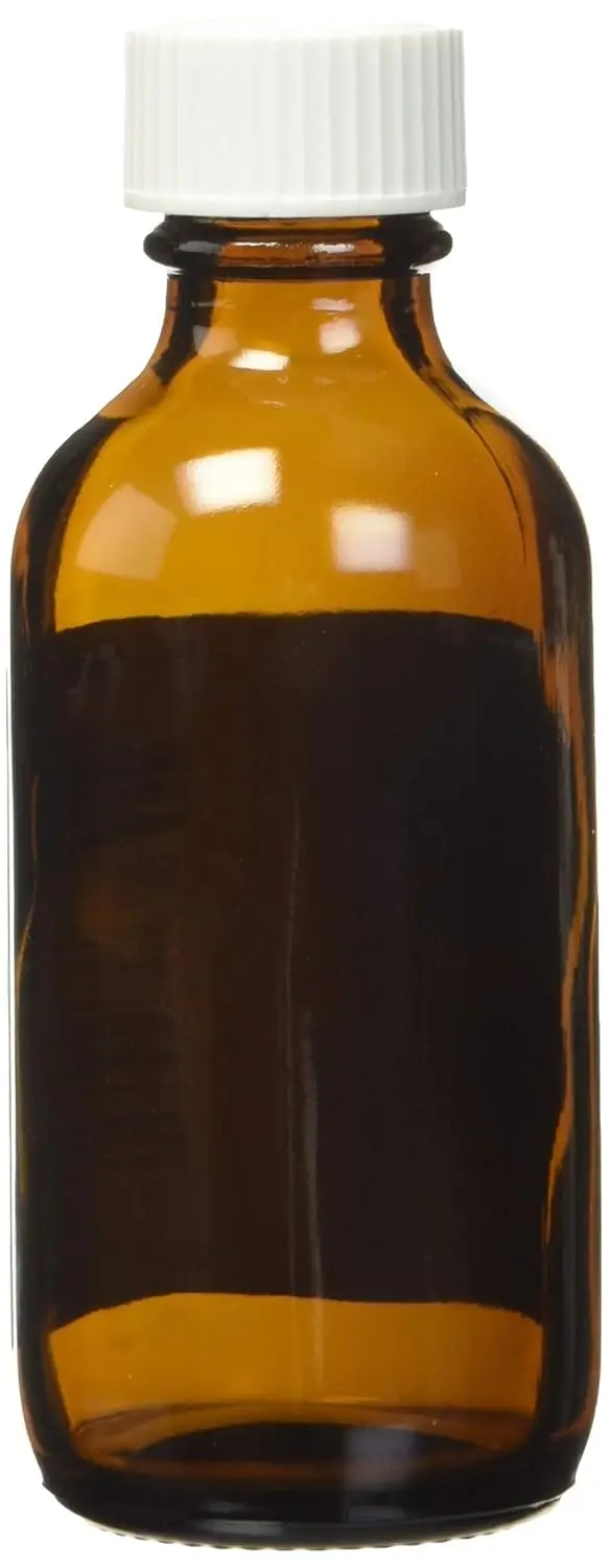 This is a 2 fl. oz. amber glass Aura Cacia bottle with a writable label, perfect for storing homemade body care products.