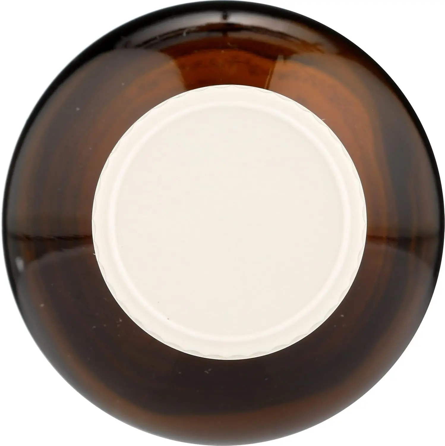 This is a 2 fl. oz. amber glass Aura Cacia bottle with a writable label, perfect for storing homemade body care products.