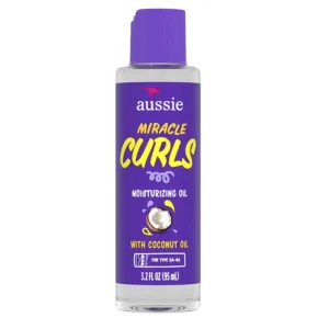 Aussie Miracle Curl hair oil treatment with coconut and Australian jojoba oil helps define curls and lock in hydration.