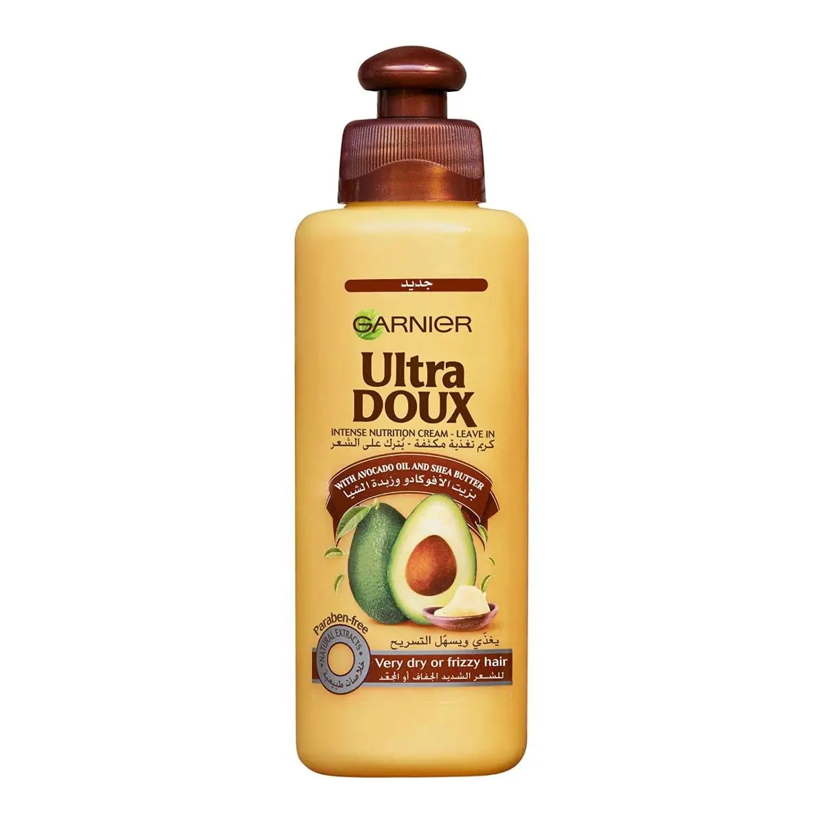 Garnier Ultra Doux leave-in cream with avocado oil and shea butter deeply nourishes and hydrates hair, protecting it from heat for smooth, shiny, and manageable styles.
