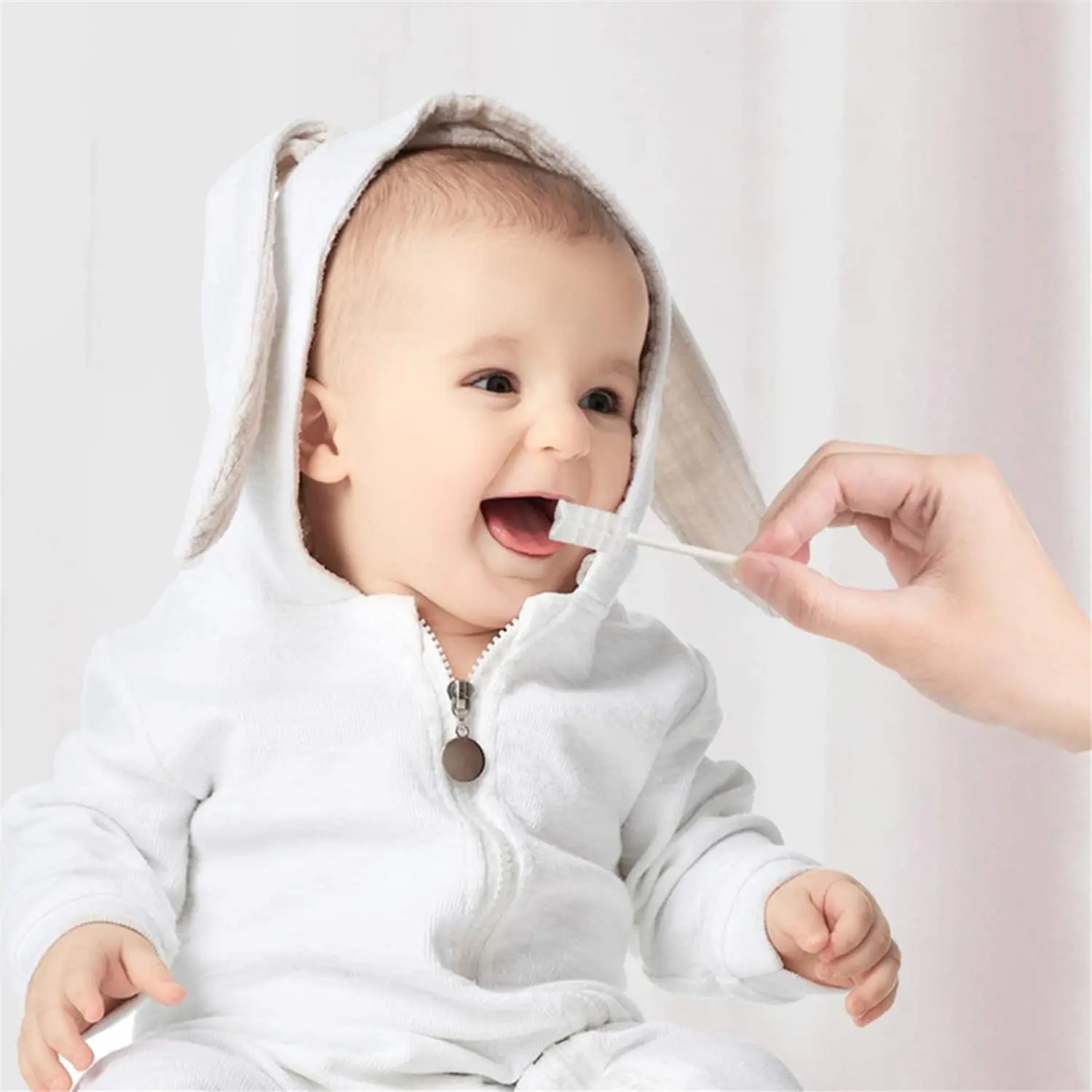 This image shows a pack of 30 disposable baby tongue cleaners, individually wrapped for sterile infant oral care.