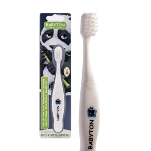 Eco-friendly baby toothbrush made from biodegradable corn cob with soft, rounded bristles for gentle cleaning and an ergonomic handle for little hands.