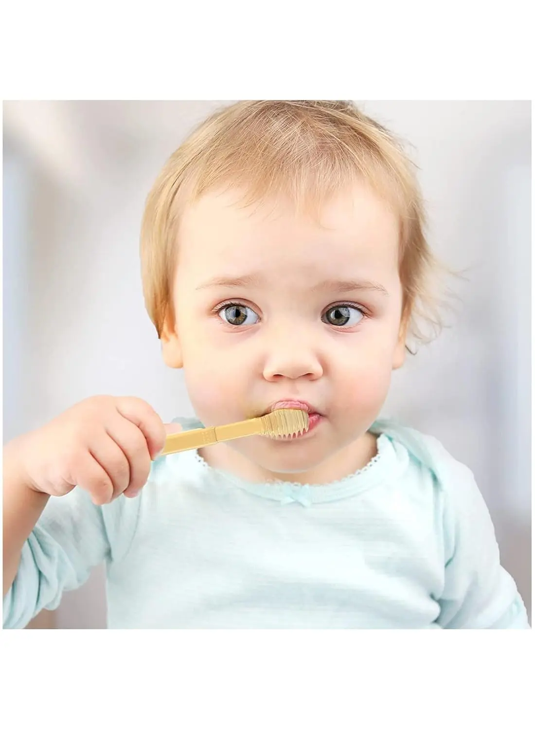 This baby toothbrush and tongue cleaner set includes a soft silicone toothbrush, tongue brush, and travel case for gentle oral care for infants 0-18 months.