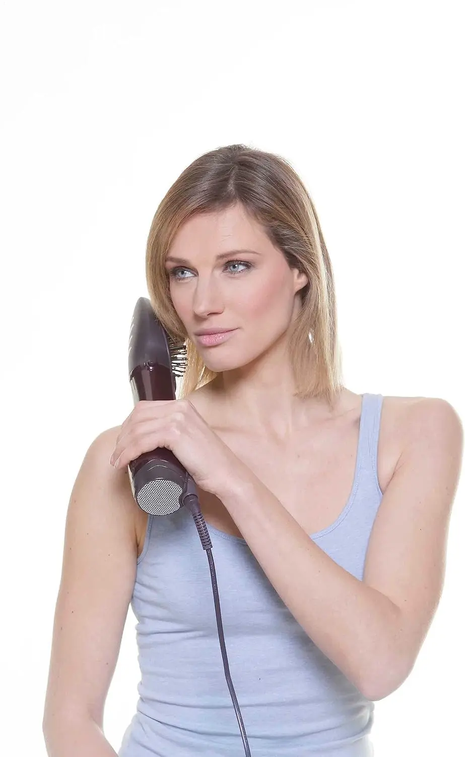 BaByliss AS115SDE paddle air brush airstyler with three attachments, featuring ionic technology and adjustable speed and temperature settings for quick drying and styling.