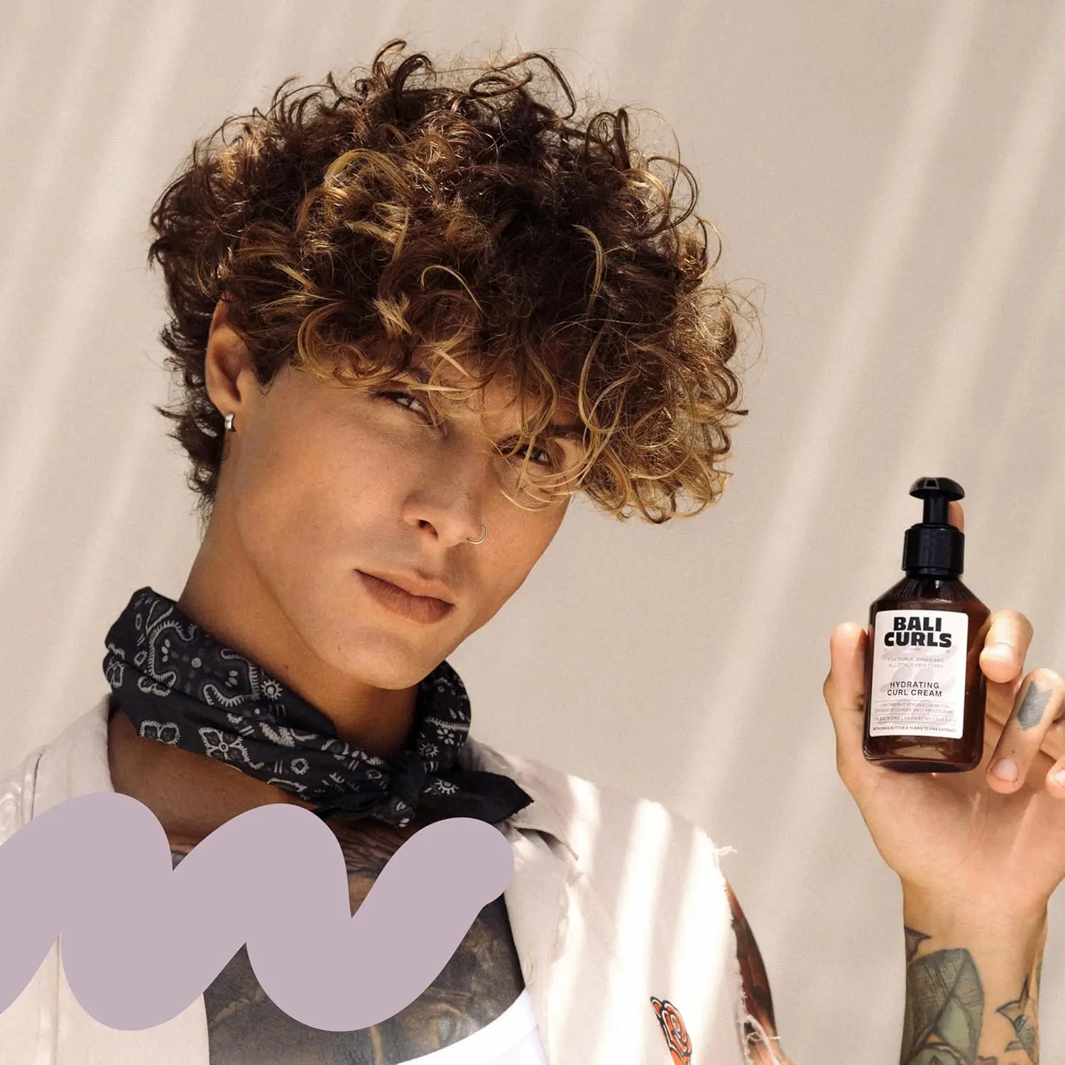 The Bali Curls Curl Defining Set, including hydrating cream and defining gel, provides moisture, definition, and flexible hold for smooth, naturally shiny curls.