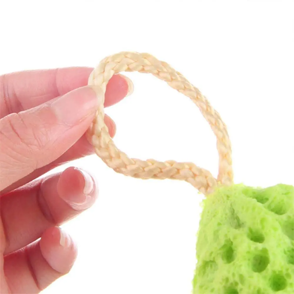 This three-pack of soft body bath sponges includes yellow, green, and orange natural fiber shower loofahs with a unique honeycomb texture for gentle exfoliating and cleansing.