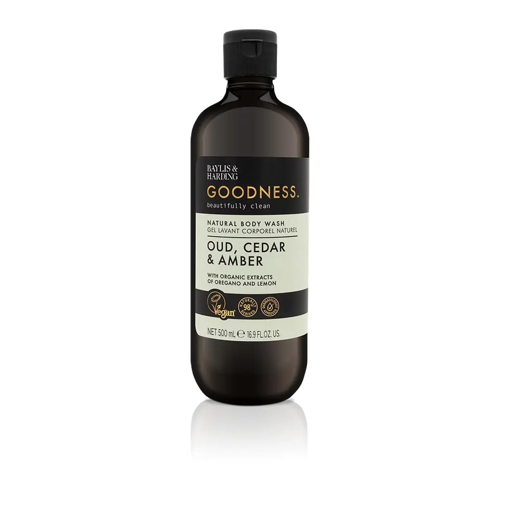 A bottle of Baylis & Harding Goodness body wash featuring a luxurious fragrance fusion of Oud, Cedar and Amber, providing a refreshing and nourishing cleanse suitable for vegans.