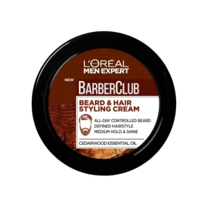 L'Oréal Barber Club beard and hair cream provides all-day beard control and hairstyle definition with cedar wood essential oil and a light hold.