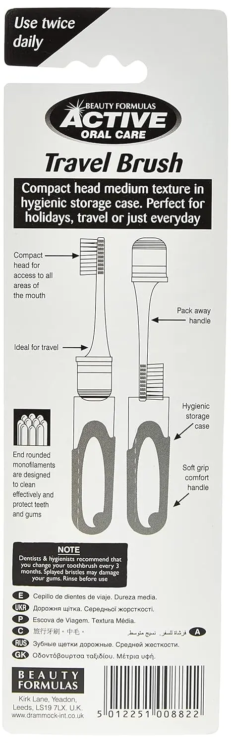 Two Beauty Formulas Active Oral Care travel toothbrushes with assorted colors, designed with round-ended filaments for gentle cleaning and a comfortable handle.