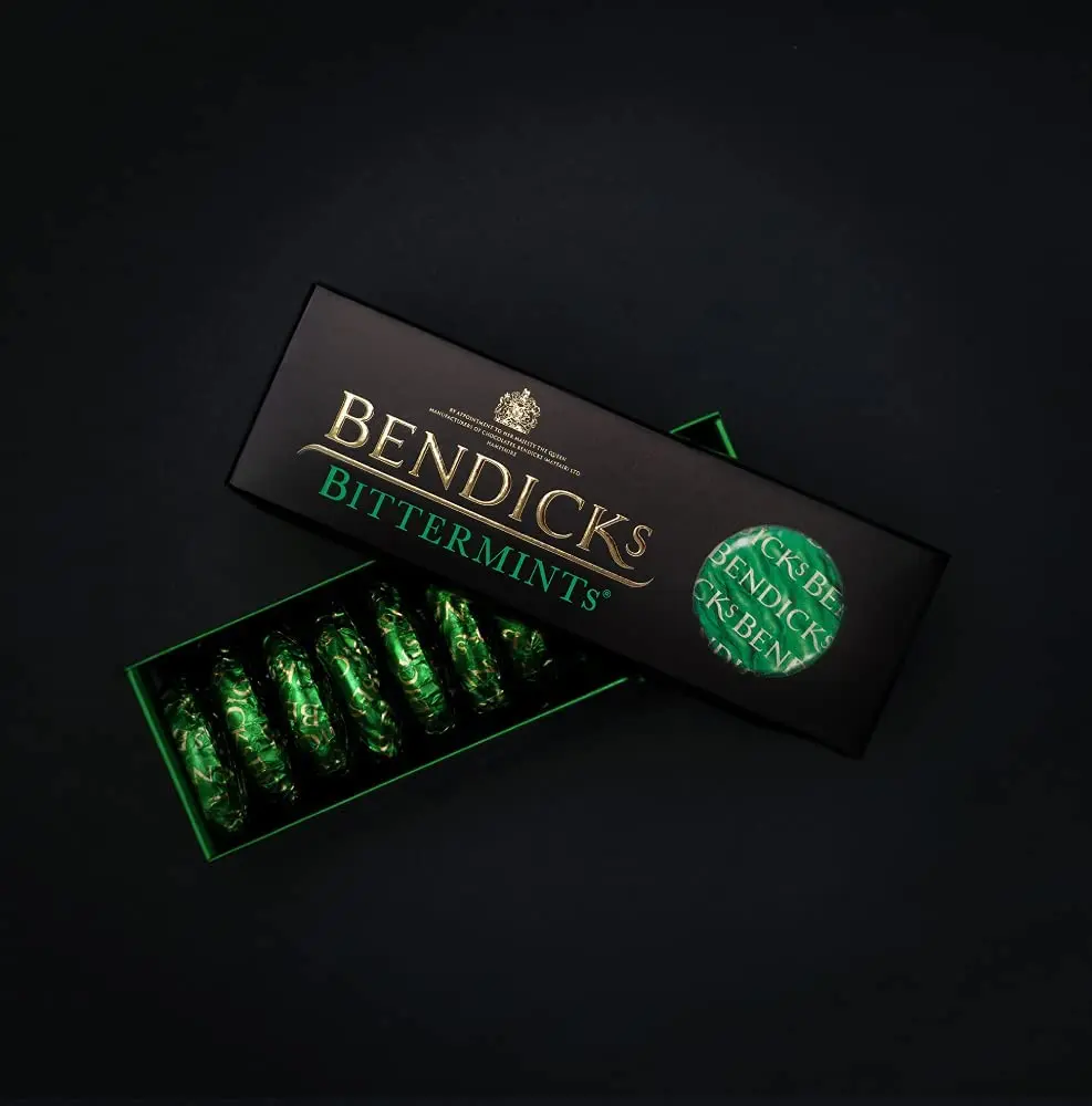 A box of Bendicks Bittermints, the UK's famous dark mint chocolates that are vegan, kosher parev certified, and gluten-free.