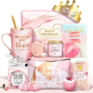 This 12-piece pink birthday gift set for women includes a marble mug, bath bomb, scented candle, makeup bag, jewelry, and more self-care items for a relaxing spa experience.