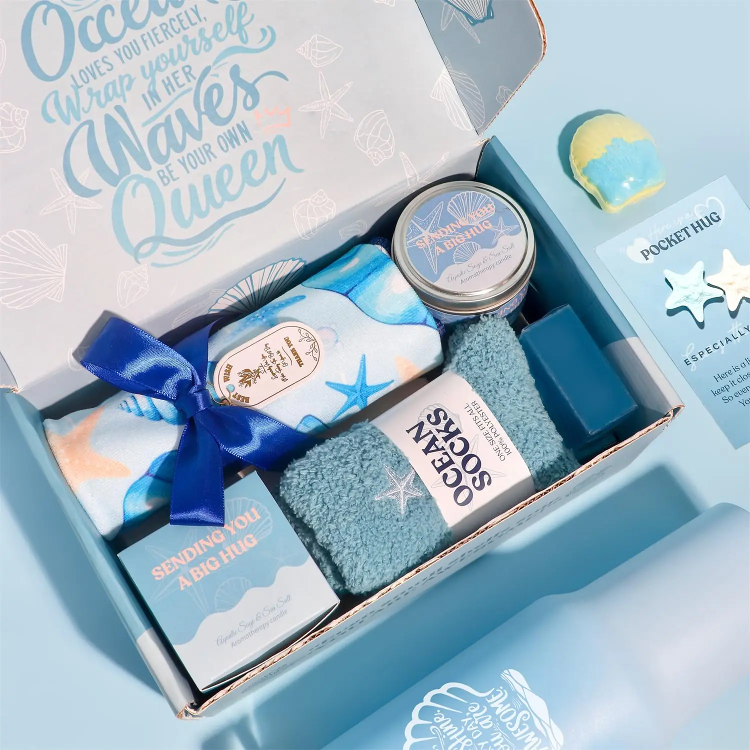 This blue ocean themed spa gift set for women includes a candle, blanket, tumbler, and bath products, perfect for birthdays and self-care.