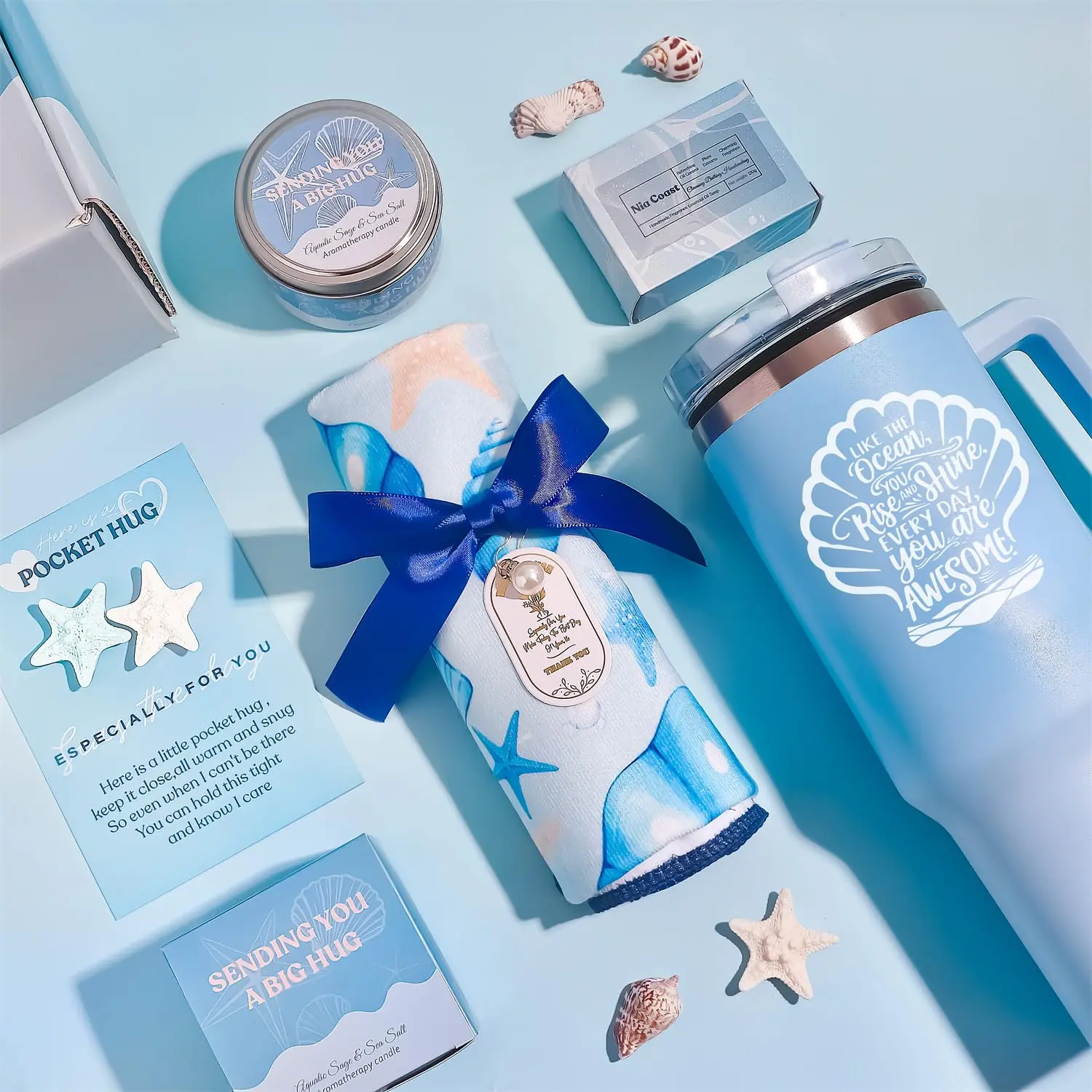 This blue ocean themed spa gift set for women includes a candle, blanket, tumbler, and bath products, perfect for birthdays and self-care.