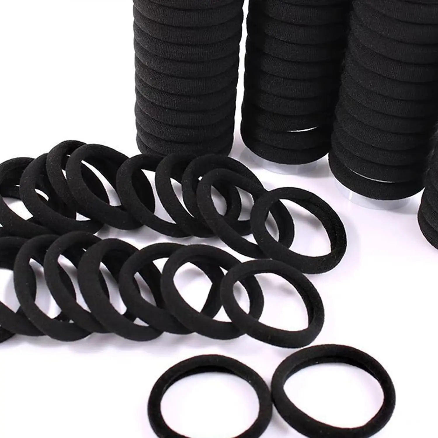 This image displays a collection of 200 black elastic hair ties in two sizes, perfect for creating various hairstyles for women and girls at home, in the gym, while traveling, or in a salon.