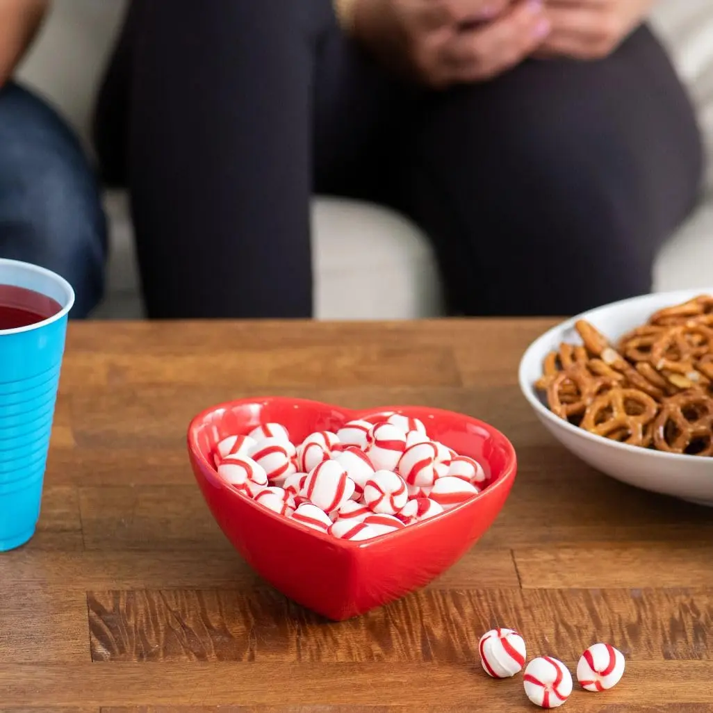 Jar of Bob's Sweet Stripes soft peppermint candy, a classic individually wrapped mint treat with a sweet peppermint flavor and only 60 calories per serving.