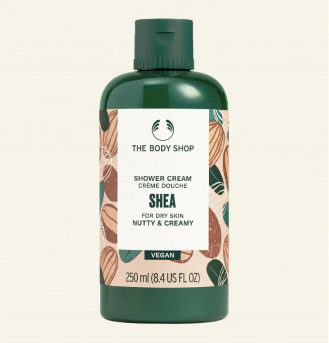 The Body Shop Shea Gift Set includes Shea Shower Cream, Body Butter, Hand Balm, Soap, and a Ramie Bath Flower for cleansing, nourishing, and pampering dry skin.