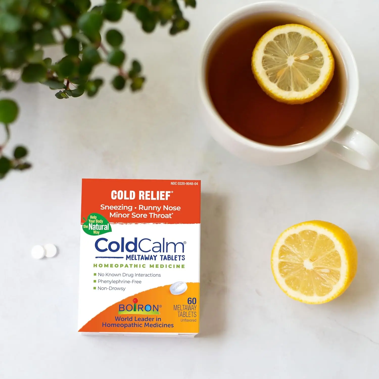 A box of Boiron Coldcalm homeopathic medicine provides relief from cold symptoms like sneezing, runny nose, and sore throat for adults and children ages 3 and up.