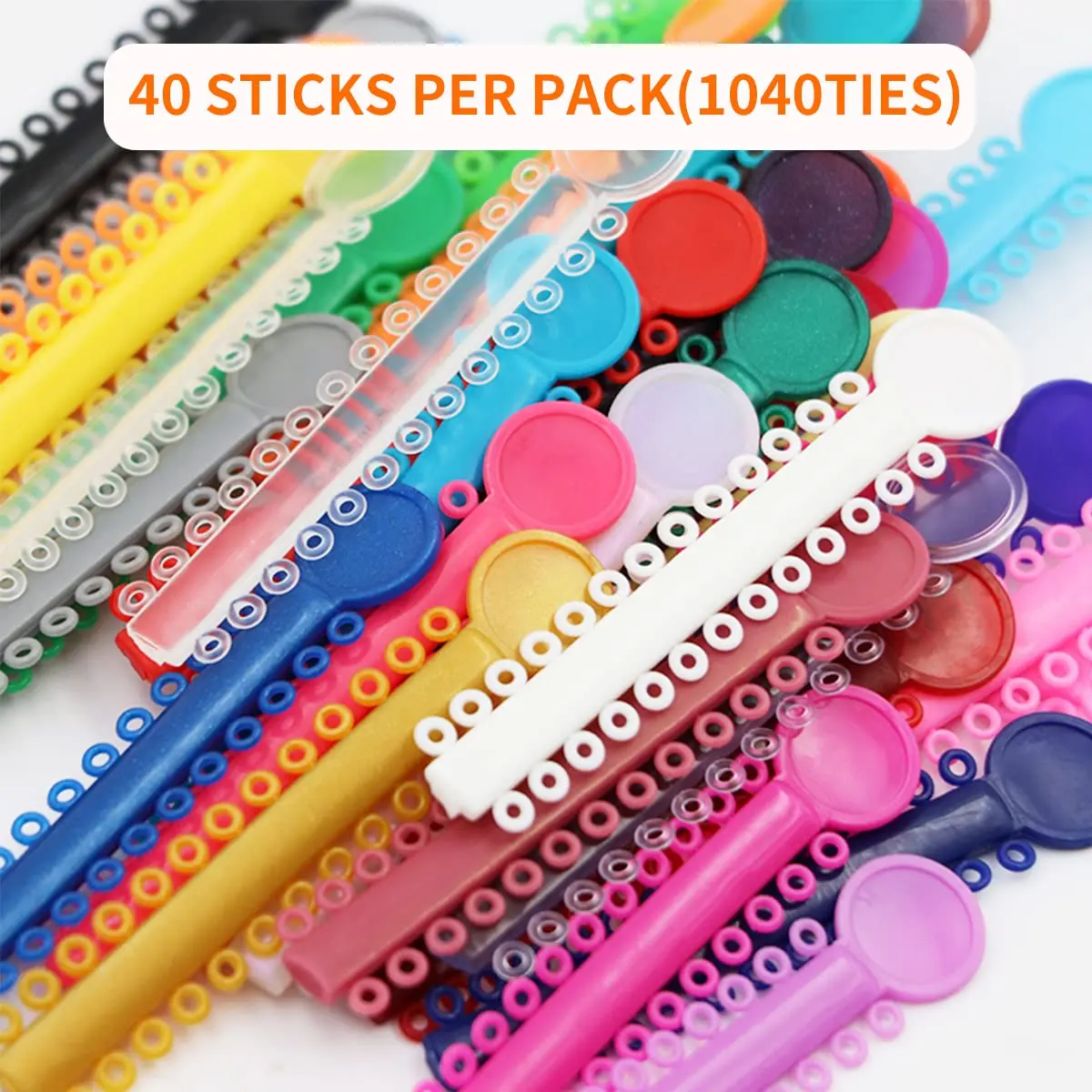 Multicolored orthodontic ligature ties and O-rings elastic bands for braces, made of hypoallergenic material with good elasticity, used for dental orthodontic treatment.