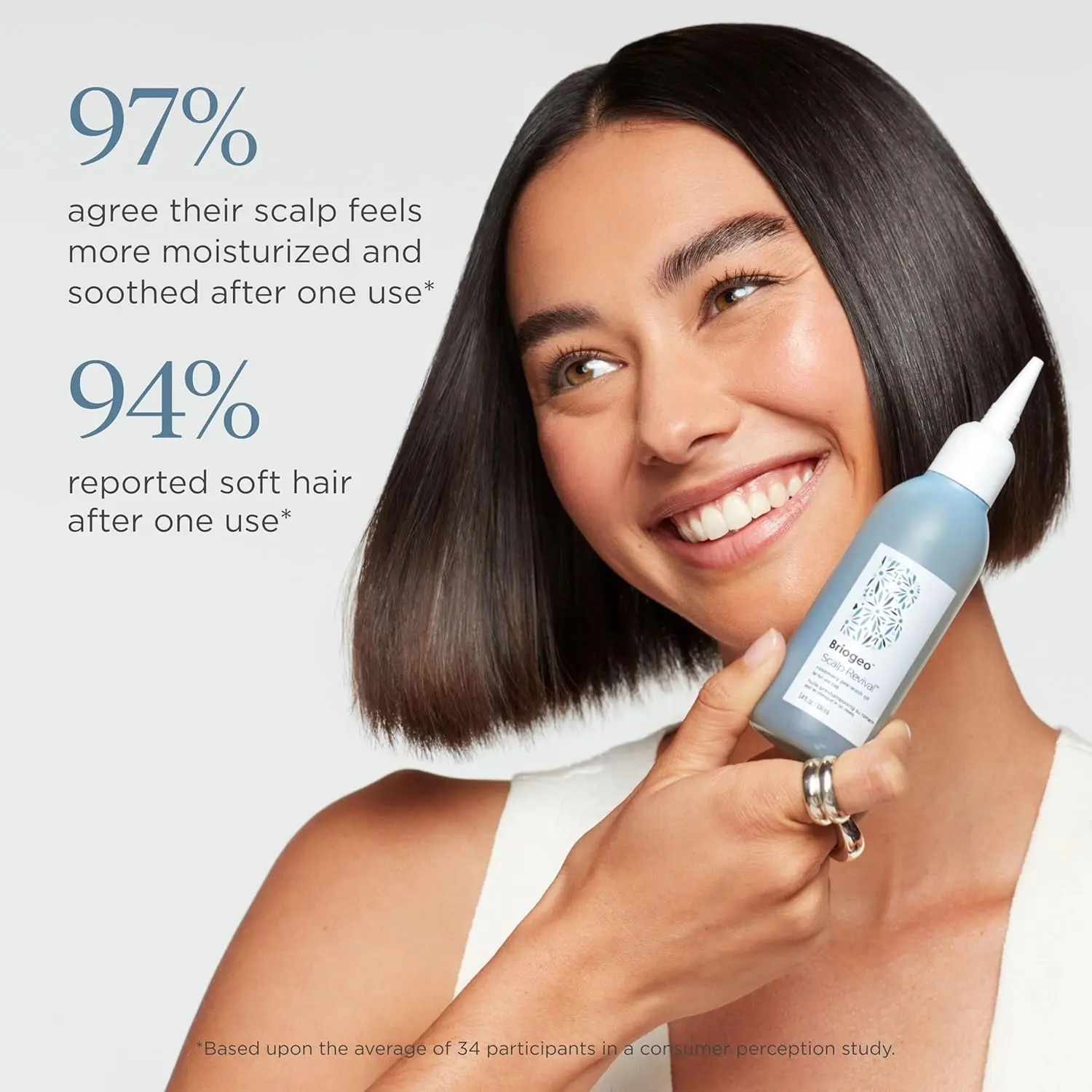 Briogeo Rosemary Scalp Revival pre-wash oil shown to soothe a dry scalp with a lightweight, vegan, and cruelty-free formula that promotes stronger hair.