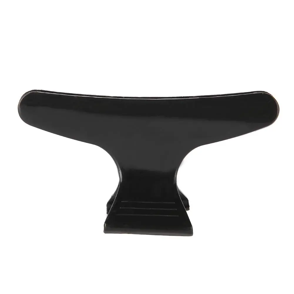 A set of 12 anti-slip butterfly hair clips is shown, designed for hairdressers and women with thick hair to section and style hair easily.