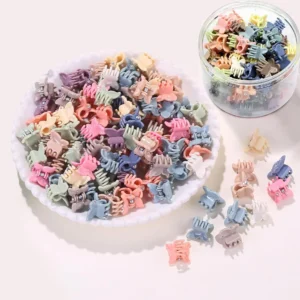 A set of 100 colorful butterfly hair clips perfect for styling baby girls', toddlers', and kids' hair, adding a fun and decorative touch for everyday wear or party styling.