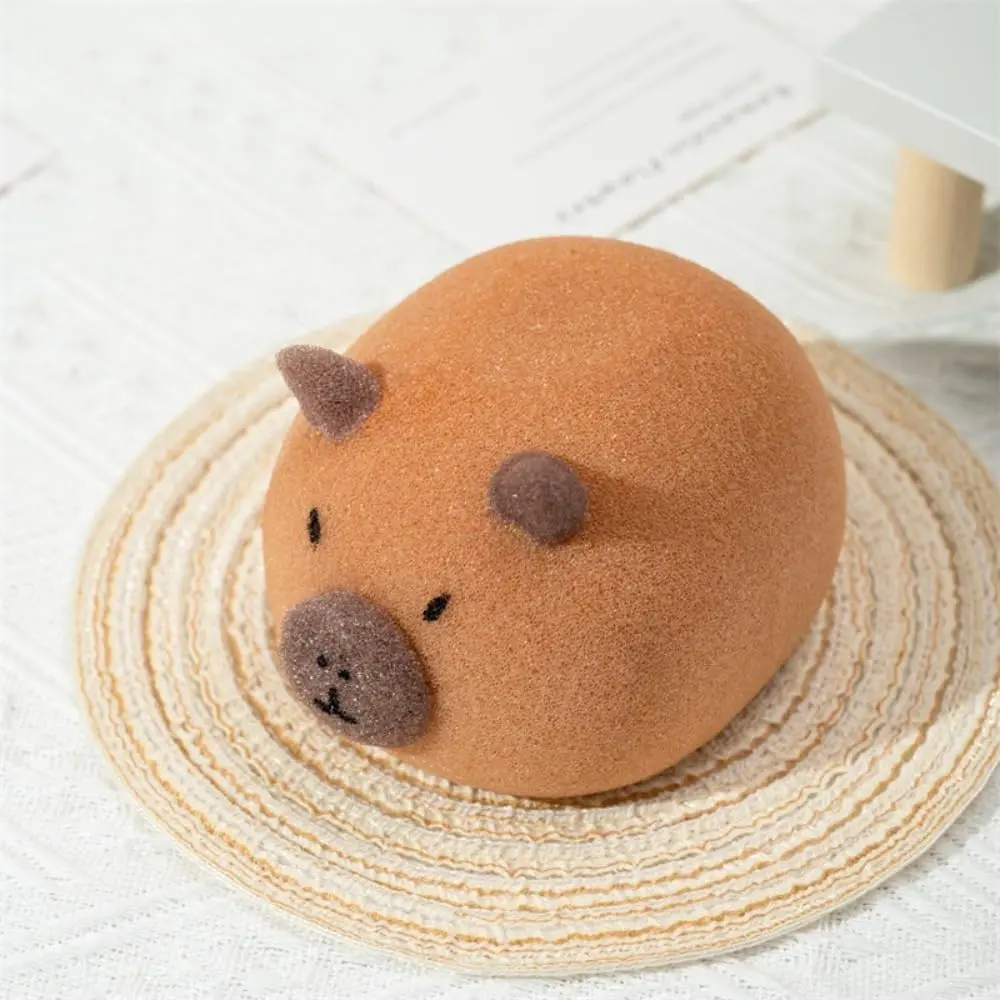 This is a cute capybara bath sponge that exfoliates and foams easily for shower massage in the bathroom.